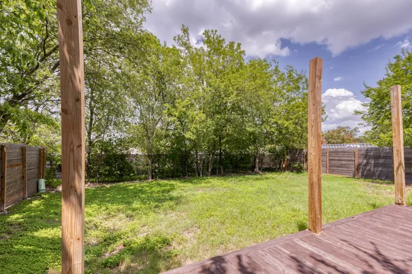 a view of a backyard with a garden