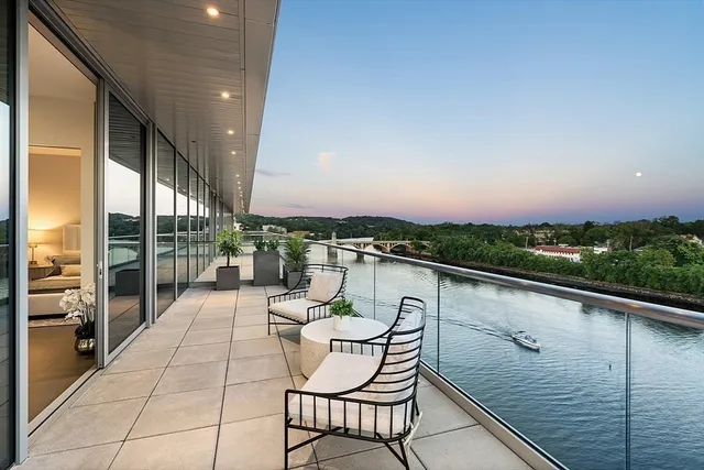 a balcony with furniture