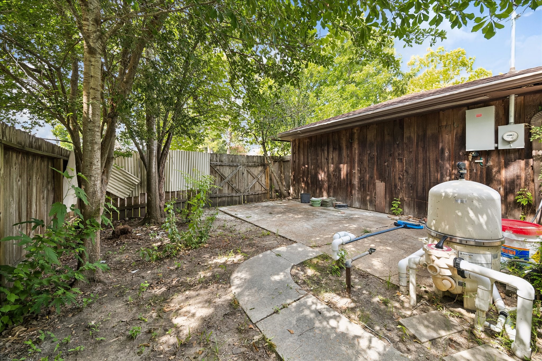 3314 Tanglewilde Street Houston, TX 77063 - Photo 22 of 23 Massive main backyard! With plenty of room for more storage or additions!