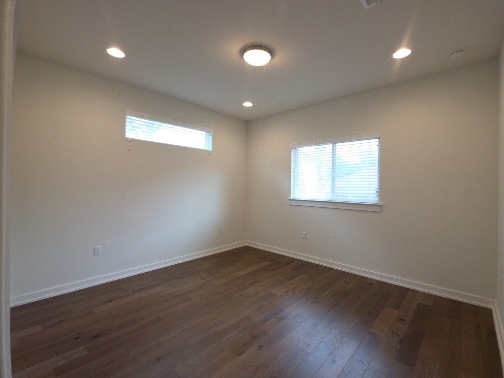 6800 Menchaca Road, Unit 42 Austin, TX 78745 - Photo 16 of 23 Secondary bedroom with natural light and closet