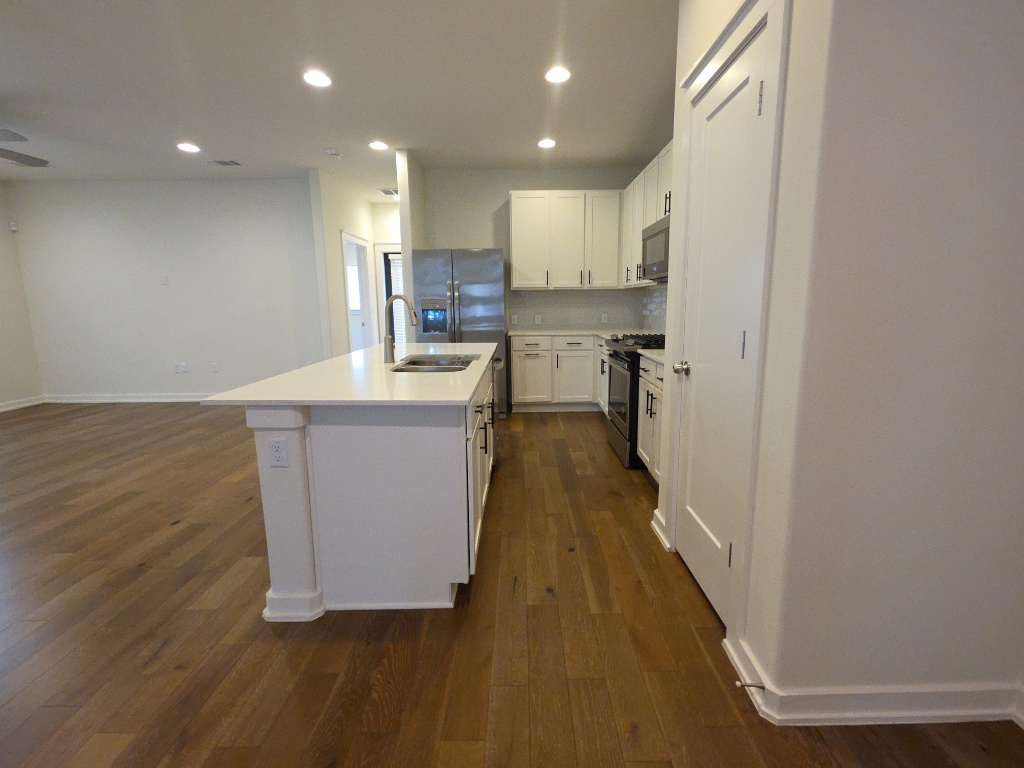 6800 Menchaca Road, Unit 42 Austin, TX 78745 - Photo 6 of 23 Kitchen with stainless steel appliances and recessed lighting