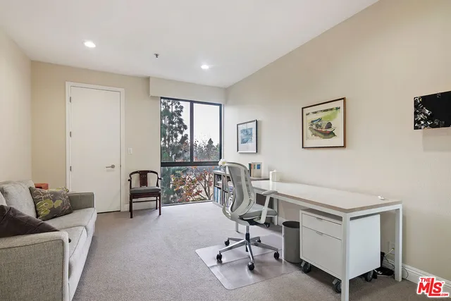 a view of a livingroom with furniture and a couch