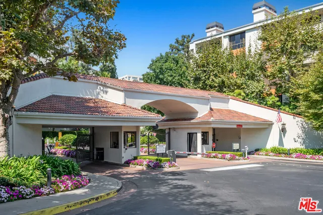 a view of a cafe with sitting area