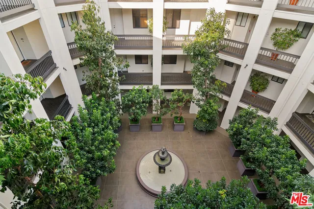 front view of a house with a garden