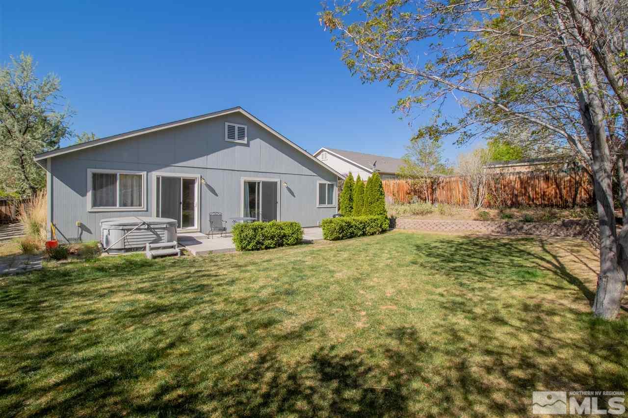 4027 Kings Row Reno, NV 89503 - Photo 16 of 17 a front view of a house with garden
