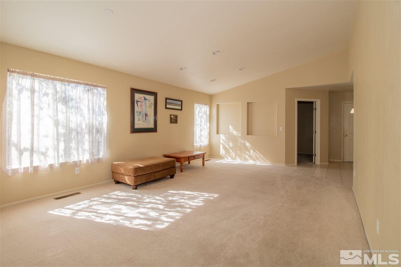 4027 Kings Row Reno, NV 89503 - Photo 3 of 17 a living room with furniture and a window
