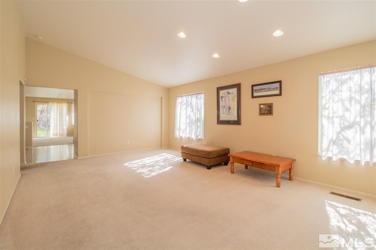 4027 Kings Row Reno, NV 89503 - Photo 4 of 17 a view of livingroom with furniture and windows