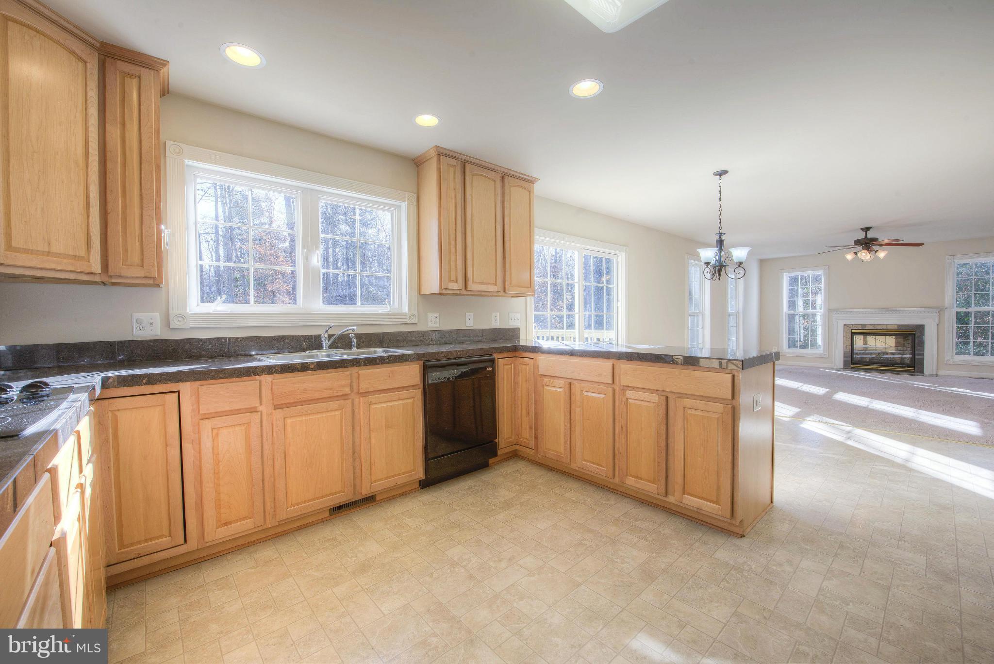 14474 Round Hill Road King George, VA 22485 - Photo 14 of 30 Large open kitchen with ceramic counters