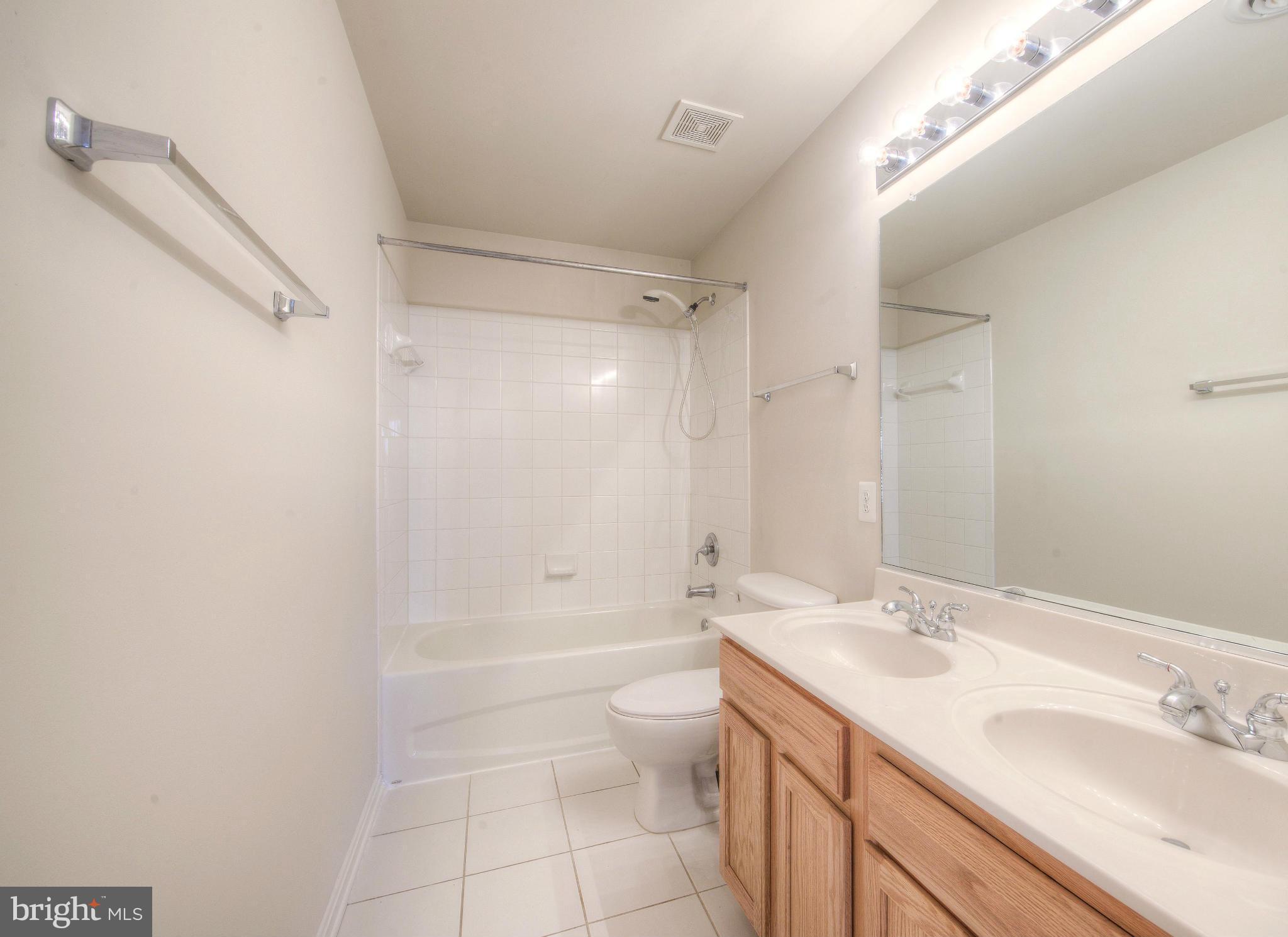 14474 Round Hill Road King George, VA 22485 - Photo 22 of 30 Hall bath with double vanity