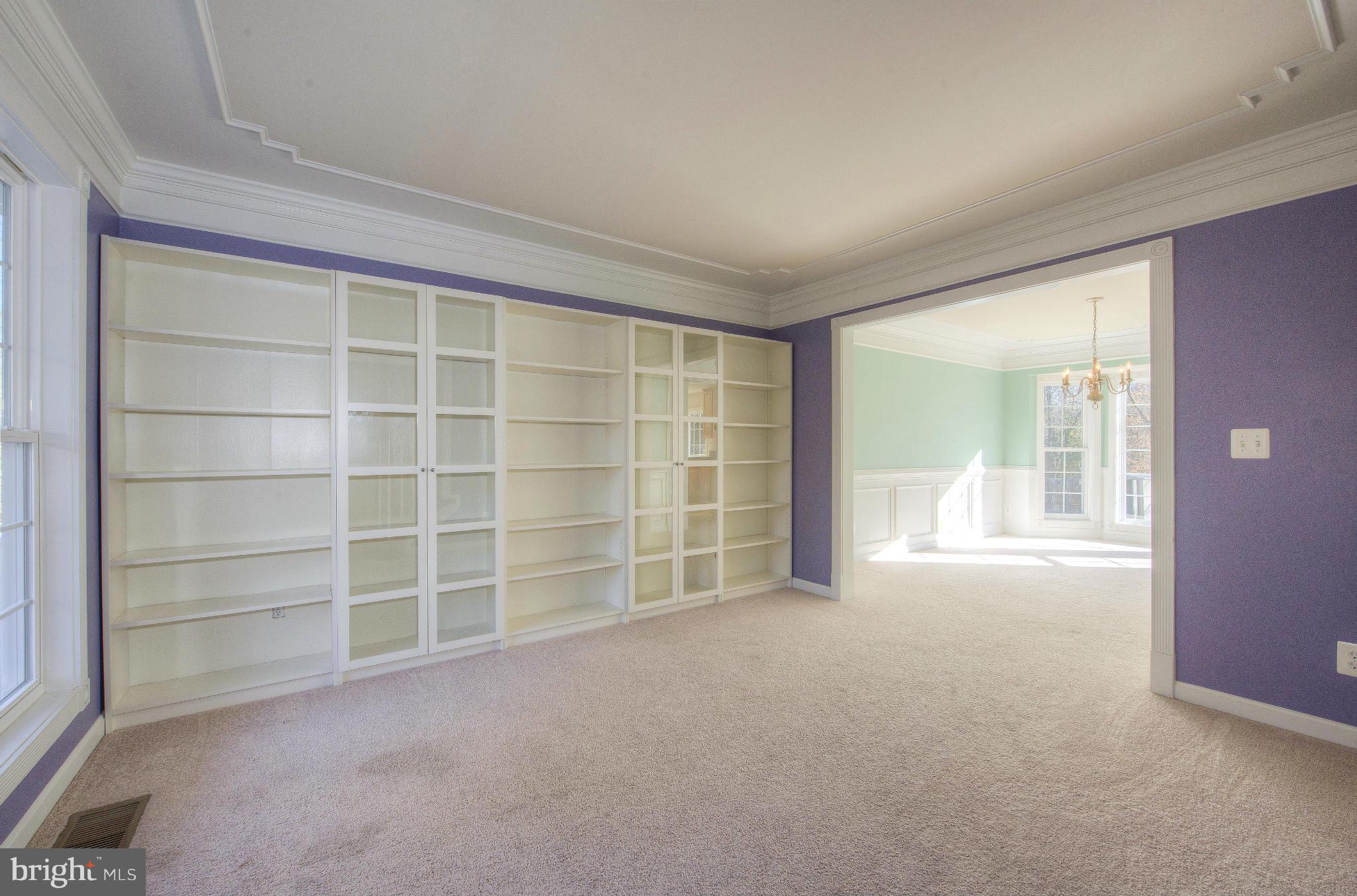 14474 Round Hill Road King George, VA 22485 - Photo 10 of 30 Wall to wall bookcases in this library/living room