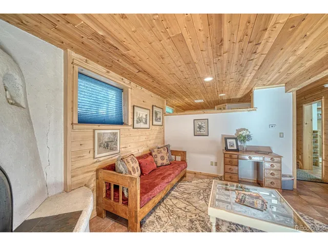 a bathroom with a tub and shower