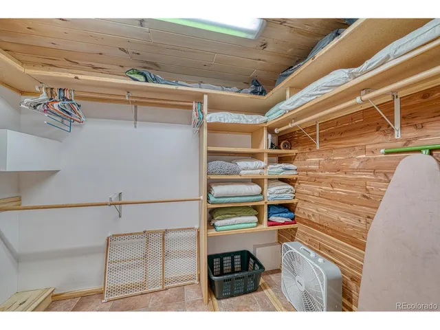 a bathroom with a sink mirror and vanity
