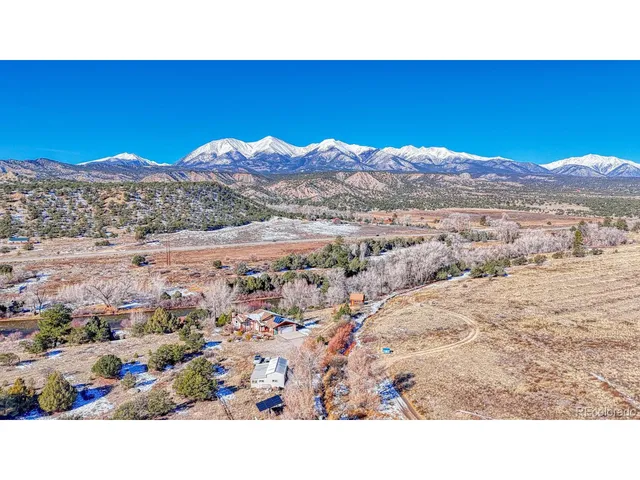 a view of a city with mountains in the background