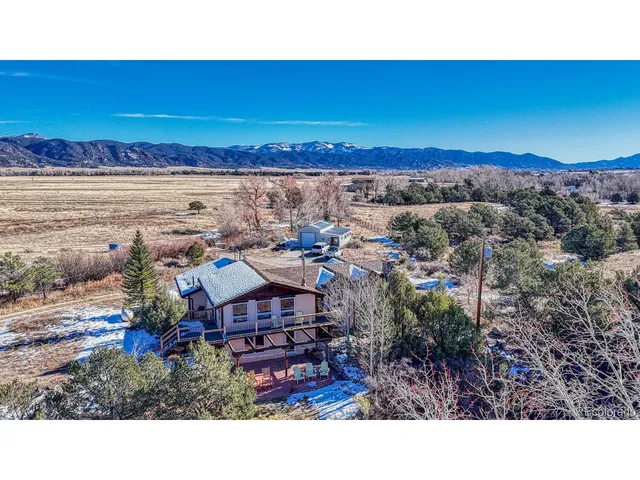 a black and white photo of a field