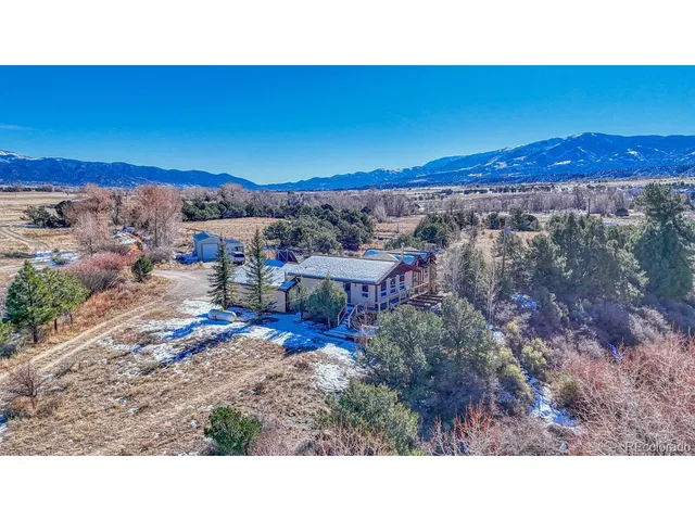 a view of balcony with wooden floor