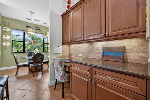 a bathroom with a toilet a sink and a mirror