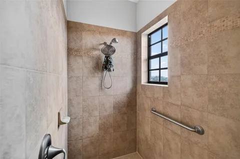 a kitchen with granite countertop a table chairs stove and granite counter top