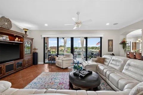 a kitchen with stainless steel appliances granite countertop a refrigerator a sink dishwasher a stove and a refrigerator