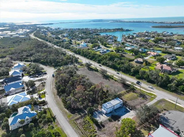 a view of a garden with lawn chairs