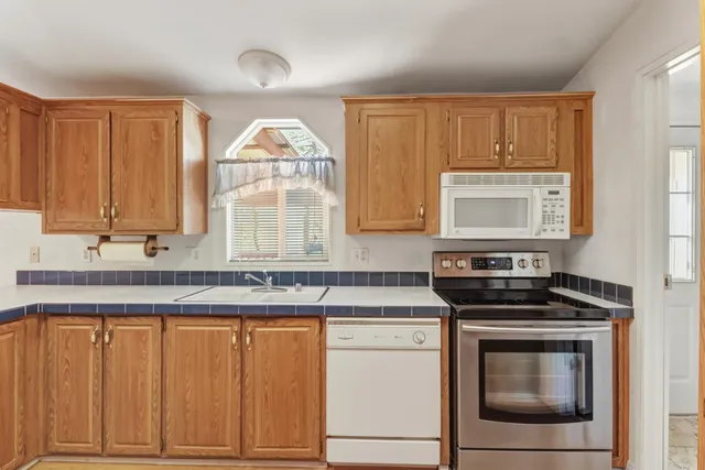 a view of empty room with windows