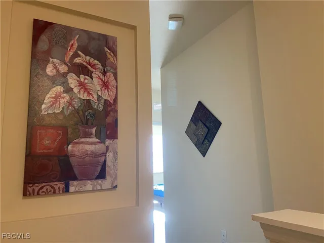 a picture of a wall with a painting on the wall