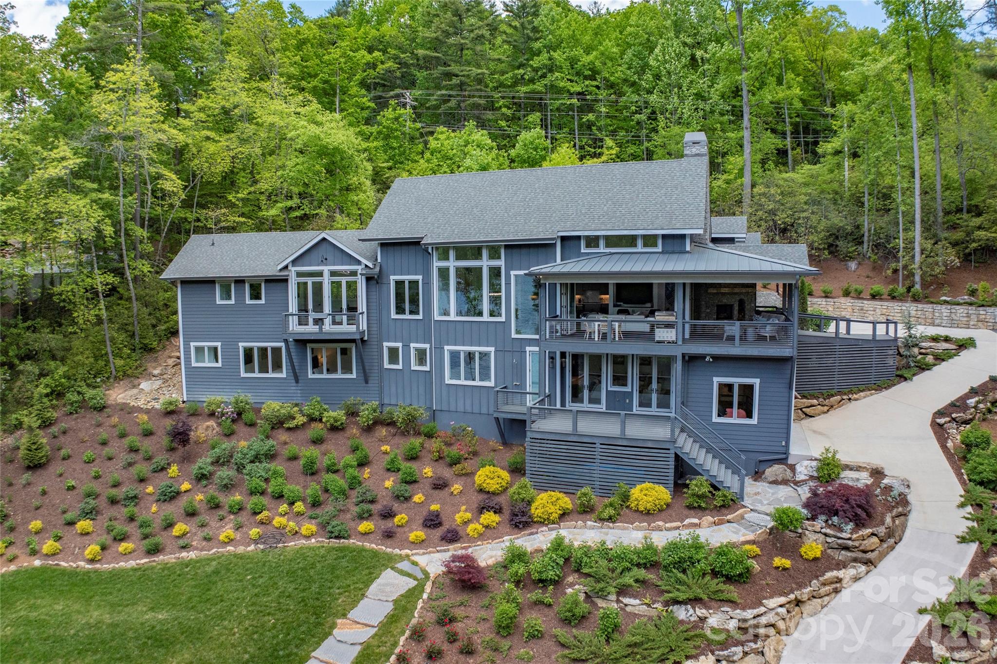 2235 Cold Mountain Road Lake Toxaway, NC 28747 - Photo 37 of 47 front view of a house with a yard