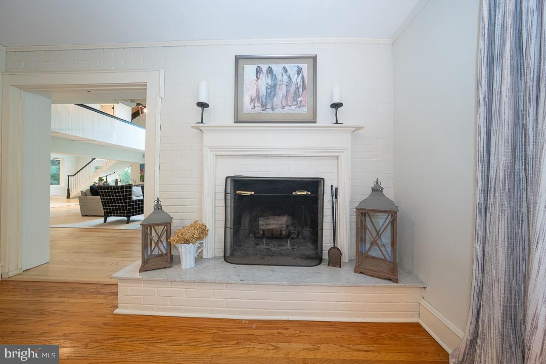 749 Mancill Road Wayne, PA 19087 - Photo 14 of 34 a living room with furniture and a fireplace