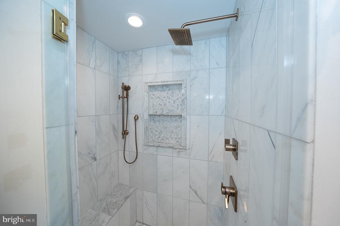 749 Mancill Road Wayne, PA 19087 - Photo 22 of 34 a bathroom with a shower