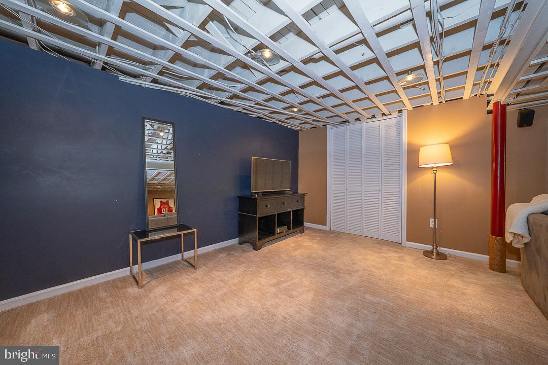 749 Mancill Road Wayne, PA 19087 - Photo 31 of 34 a view of an empty room with a fireplace