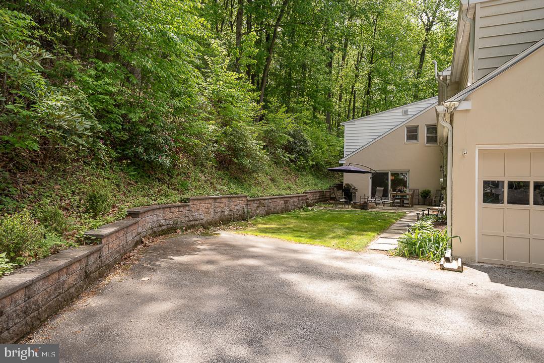 749 Mancill Road Wayne, PA 19087 - Photo 34 of 34 a view of a house with backyard and sitting area