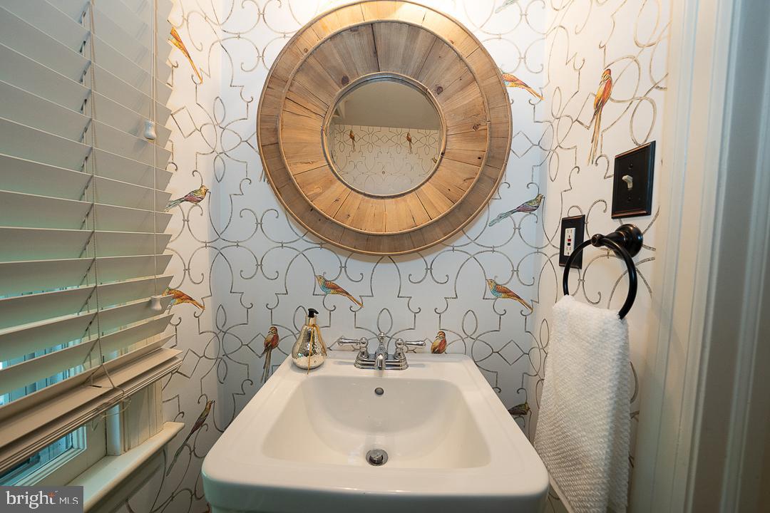 749 Mancill Road Wayne, PA 19087 - Photo 6 of 34 a bathroom with a sink and a mirror