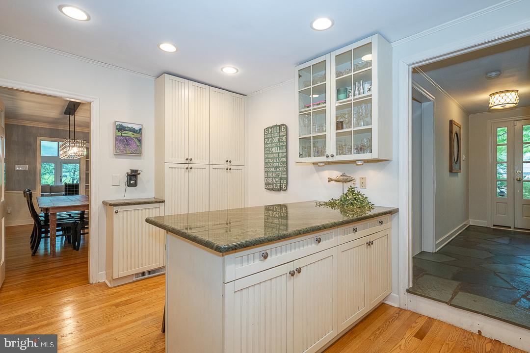 749 Mancill Road Wayne, PA 19087 - Photo 10 of 34 a kitchen with a sink window and cabinets