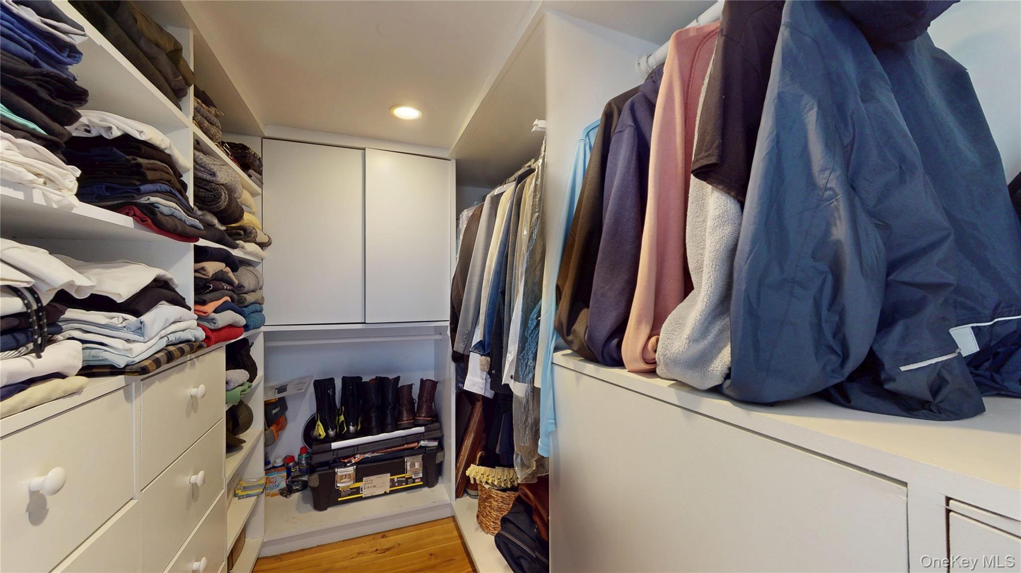 1255 5th Avenue Manhattan, NY 10029 - Photo 15 of 16 Spacious closet with light wood-style flooring