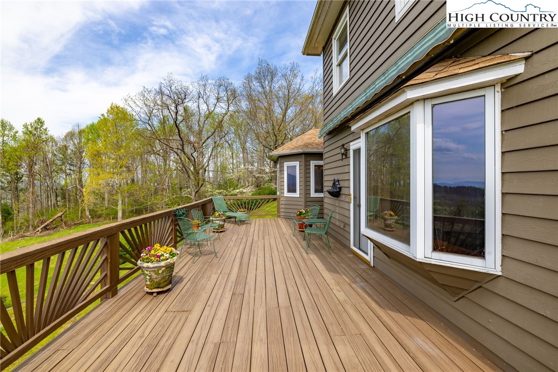 320 Buckeye Ridge Run Sparta, NC 28675 - Photo 36 of 48 a view of balcony of a house with wooden floor