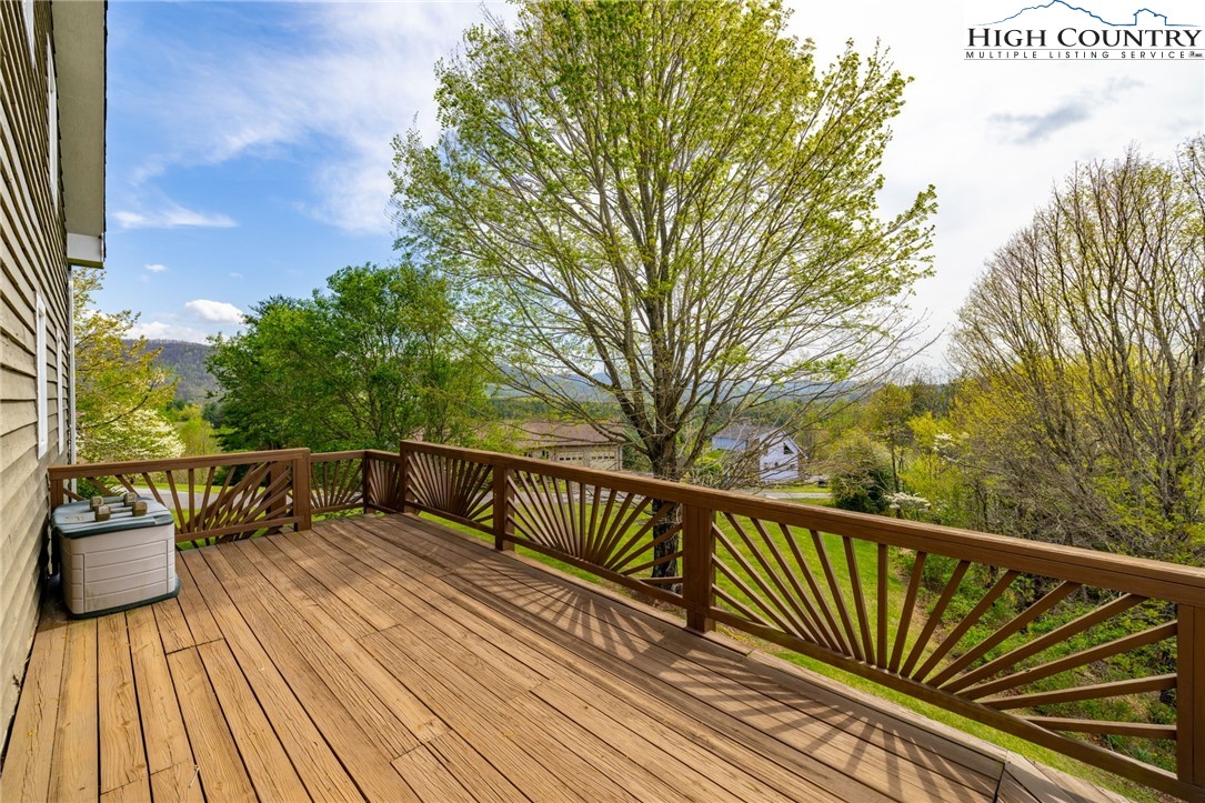 320 Buckeye Ridge Run Sparta, NC 28675 - Photo 45 of 48 a view of balcony with wooden floor and fence