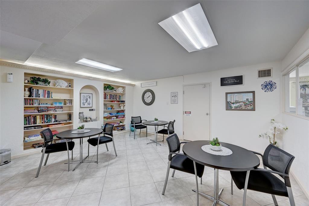111 Briny Avenue, Unit 2307 Pompano Beach, FL 33062 - Photo 26 of 47 a view of a livingroom with furniture and window