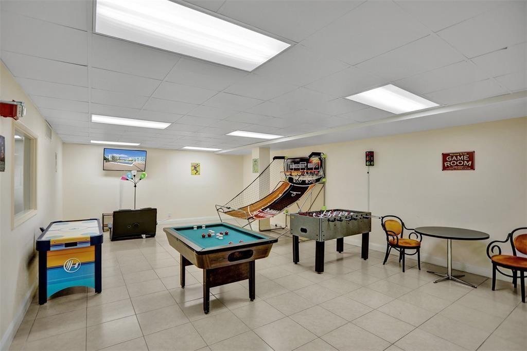 111 Briny Avenue, Unit 2307 Pompano Beach, FL 33062 - Photo 27 of 47 a living room with furniture