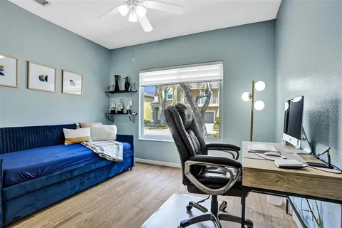 a view of a livingroom with furniture and lounge chair