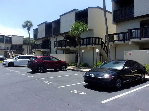 a car parked in front of a building