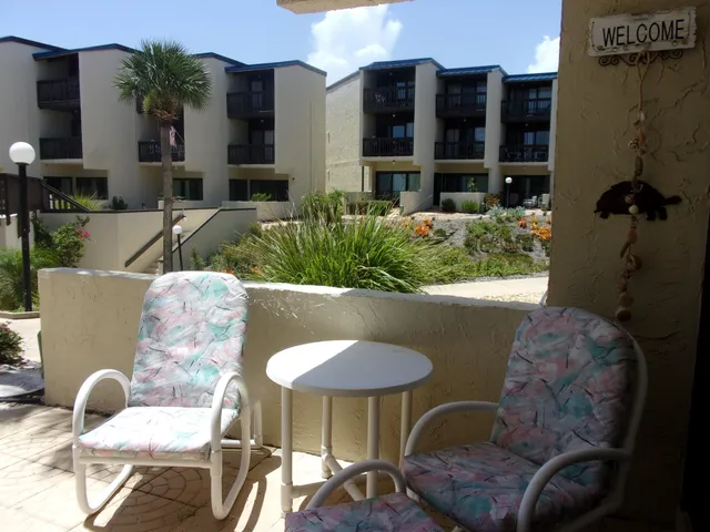 a bedroom with a bed and a dresser in it