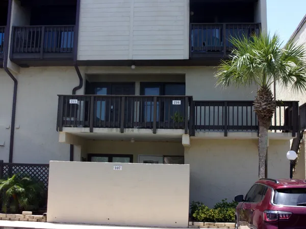 a view of balcony with furniture