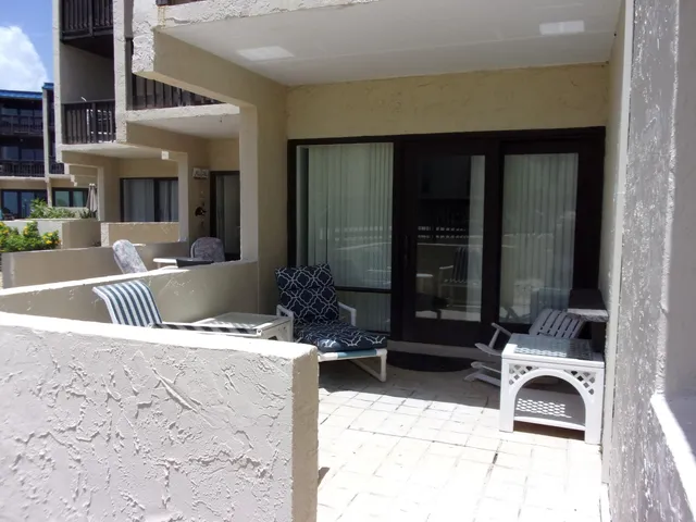 swimming pool view with outdoor seating