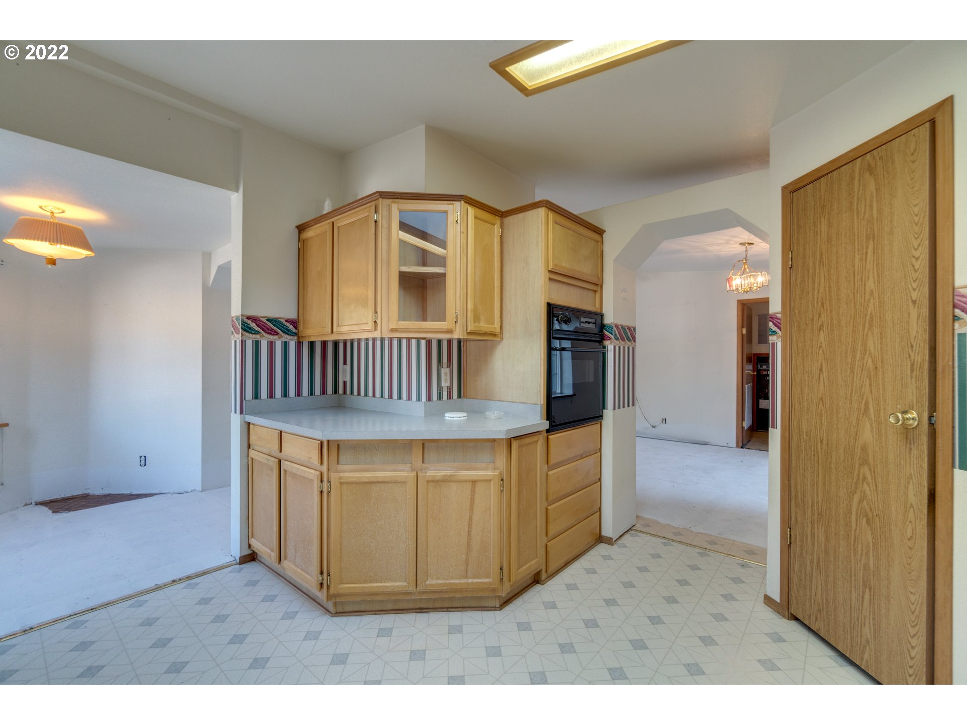 25222 East Welches Road Welches, OR 97067 - Photo 12 of 31 a view of kitchen with cabinets and wooden floor