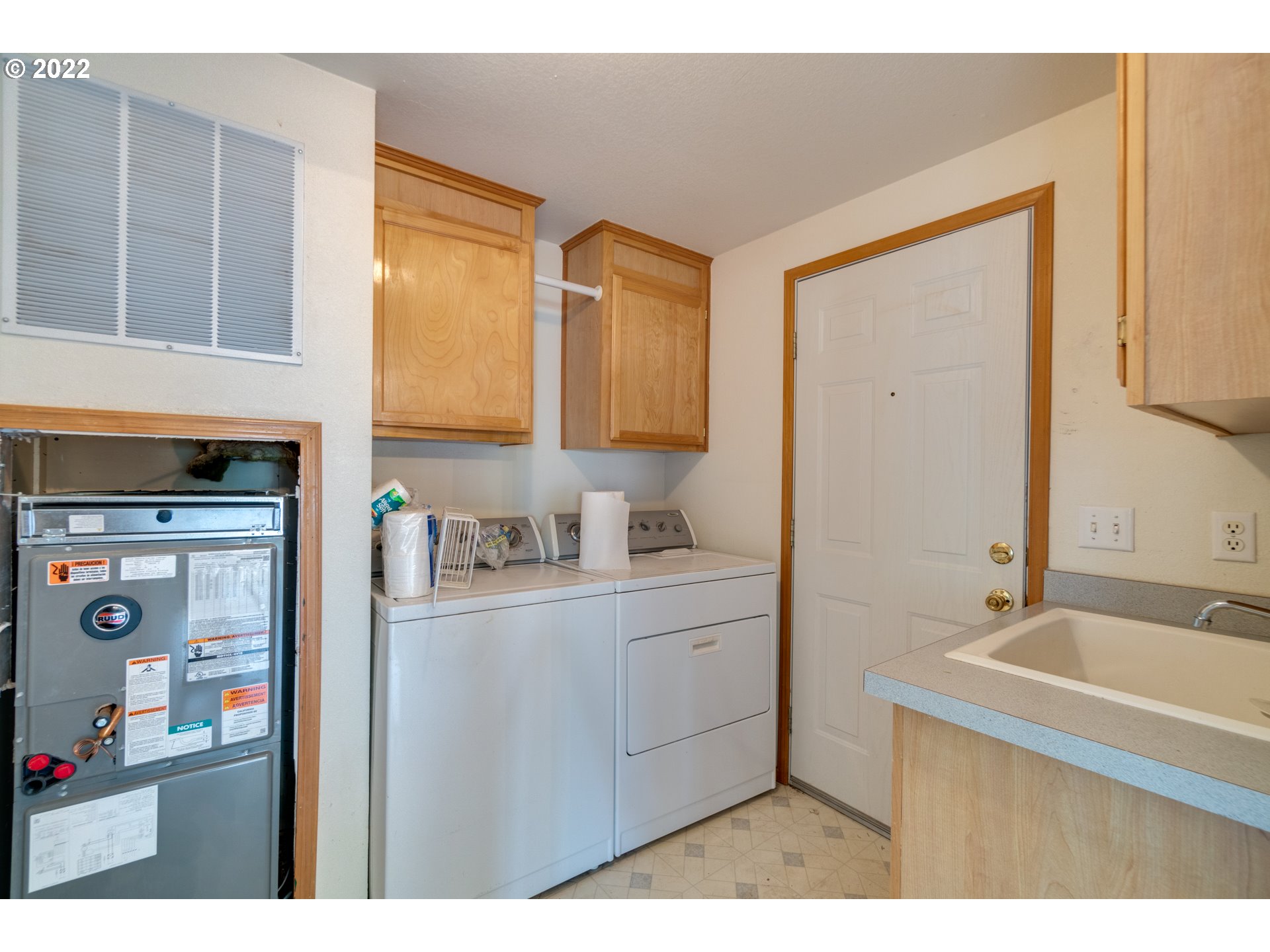 25222 East Welches Road Welches, OR 97067 - Photo 15 of 31 a bathroom with a sink a mirror and a bathtub
