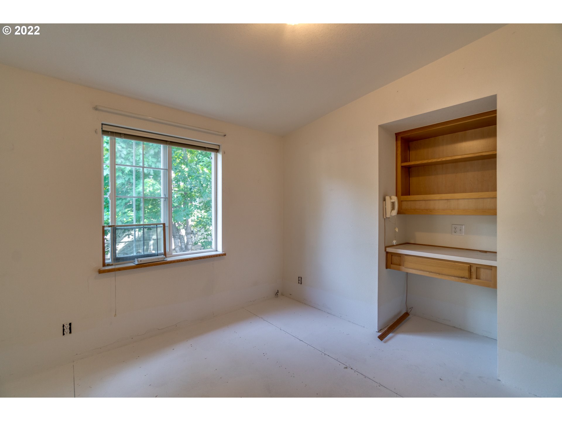 25222 East Welches Road Welches, OR 97067 - Photo 16 of 31 a view of an empty room with a window