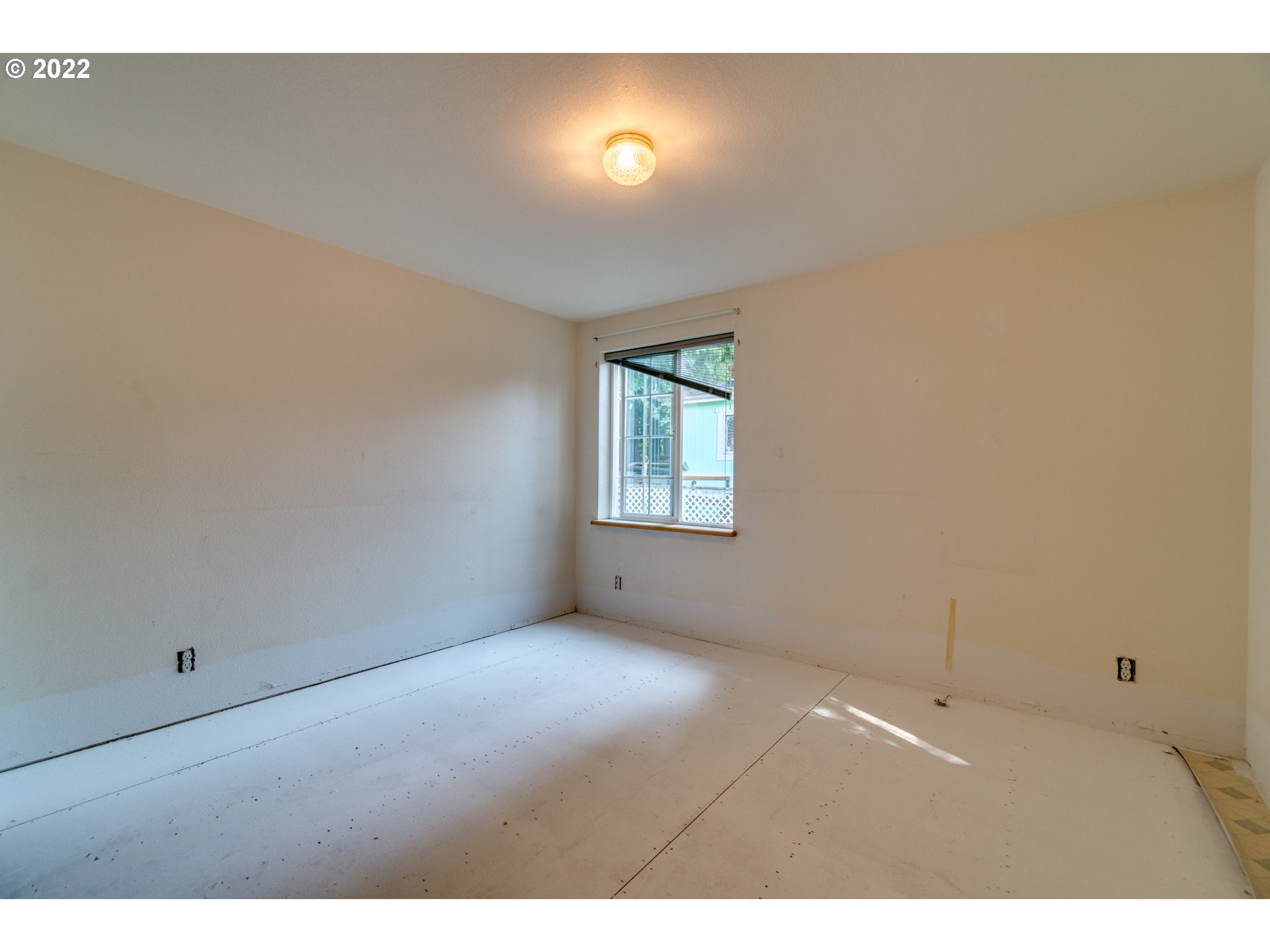 25222 East Welches Road Welches, OR 97067 - Photo 18 of 31 a view of an empty room with a window