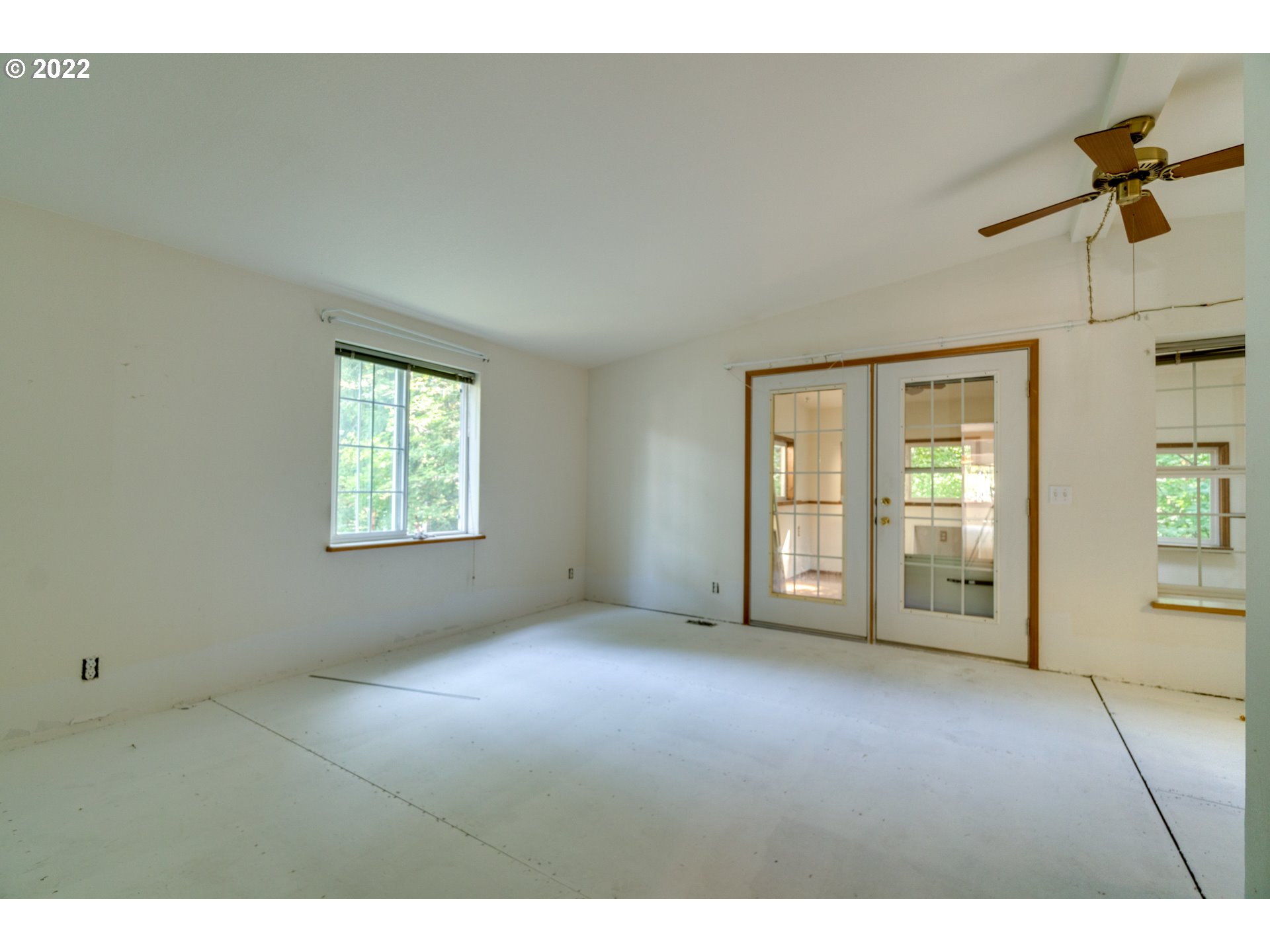 25222 East Welches Road Welches, OR 97067 - Photo 20 of 31 a view of an empty room with a window