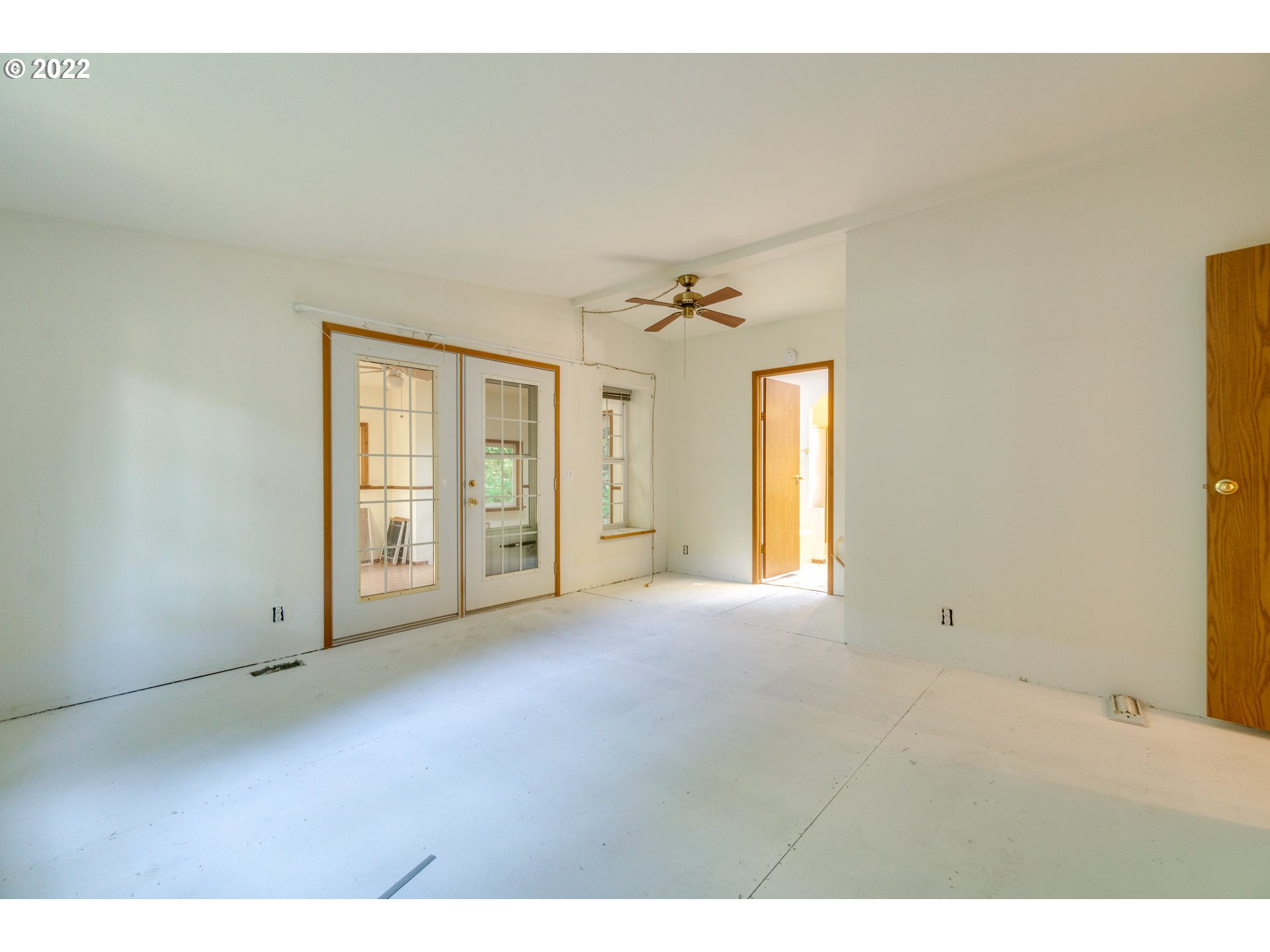 25222 East Welches Road Welches, OR 97067 - Photo 21 of 31 a view of an empty room with a window