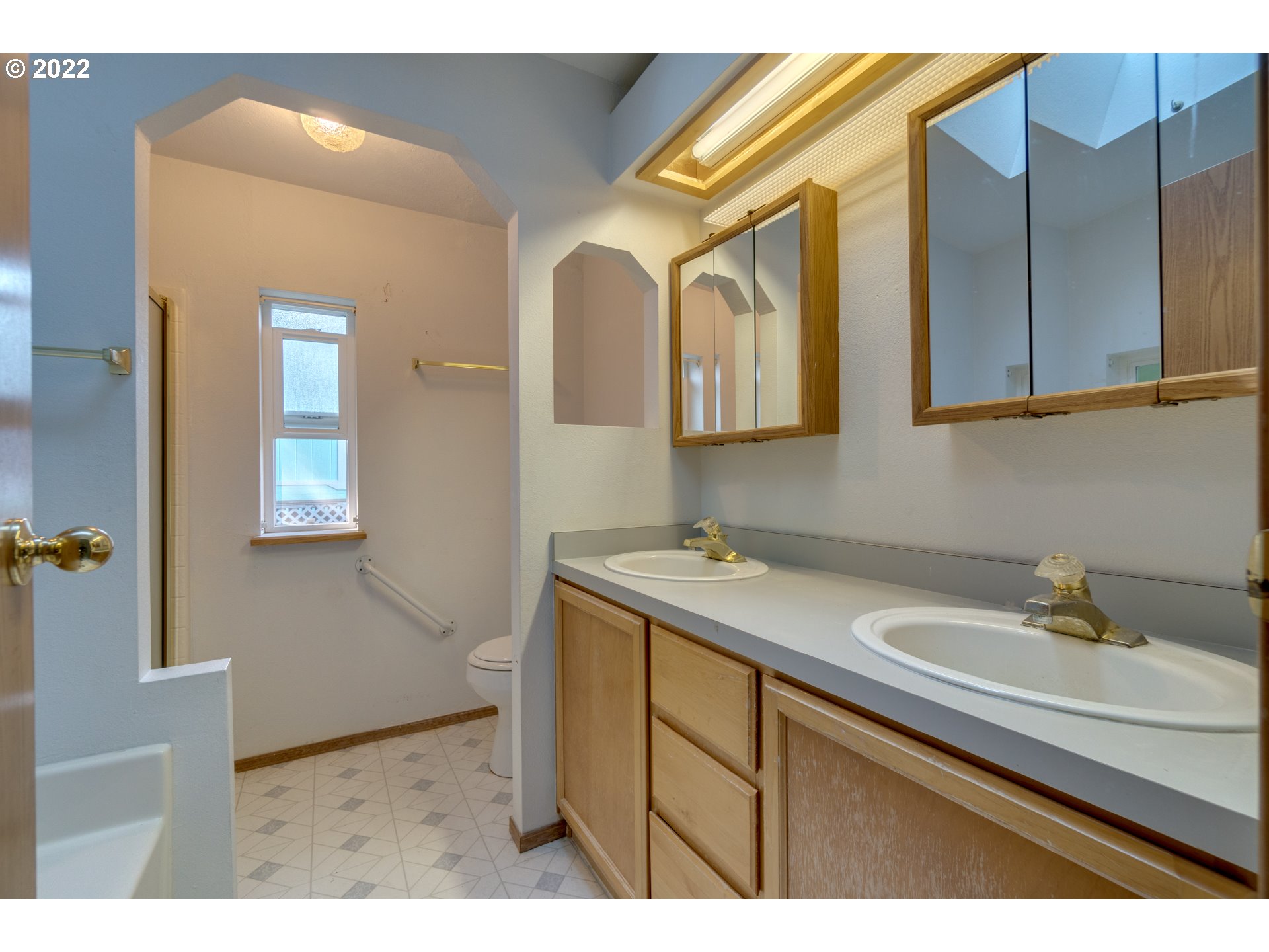 25222 East Welches Road Welches, OR 97067 - Photo 24 of 31 a bathroom with a sink vanity and mirror