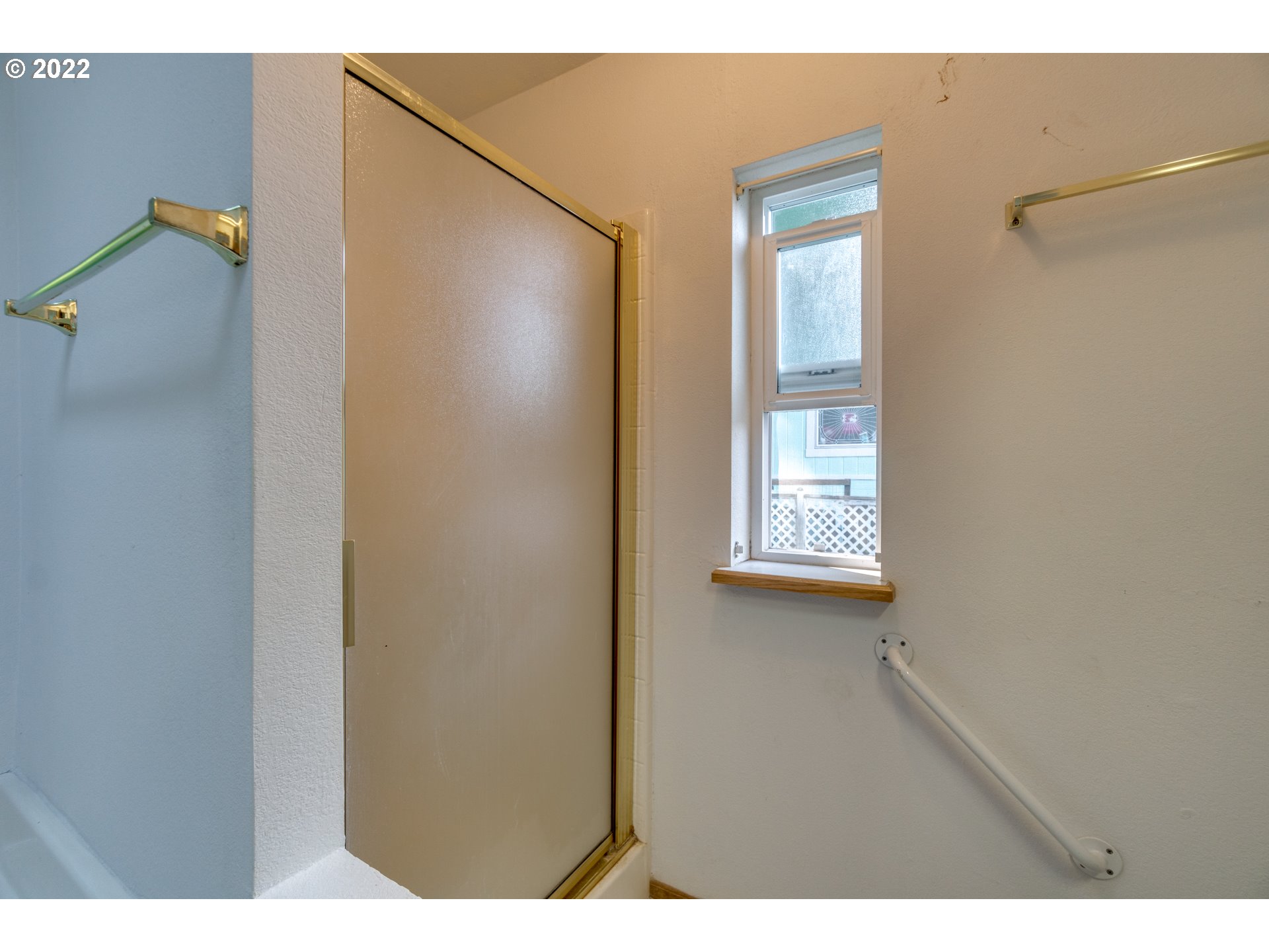 25222 East Welches Road Welches, OR 97067 - Photo 27 of 31 a view of a small space with wooden floor and a window